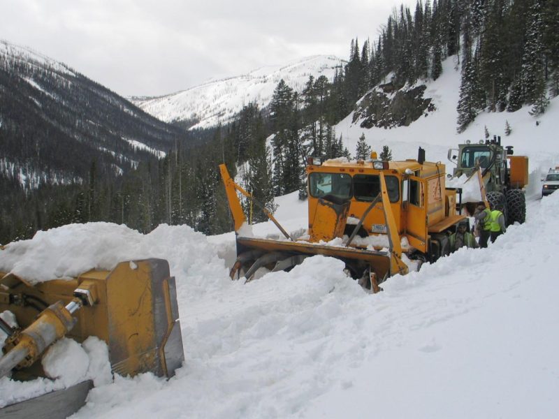 Crews work earlier this spring to plow Sylvan Pass, the highest point along the east entrance road into Yellowstone National Park. (National Park Service photo - click to enlarge)