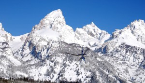 A helicopter heads toward Garnet Canyon in April during a search for two lost skiers in Grand Teton National Park. (National Park Service photo by Jackie Skaggs - click to enlarge)