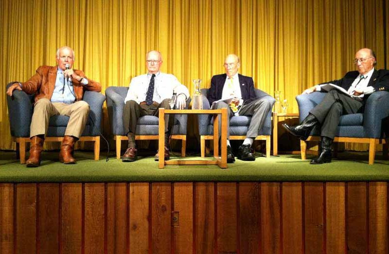 Former U.S. Fish and Wildlife Services Director John Turner, left, speaks Monday during a panel discussion in Cody that included, from left, former Environmental Protection Administration head William Ruckelshaus, former Sen. Alan Simpson and former Wyoming Gov. Mike Sullivan. (Ruffin Prevost/Yellowstone Gate - click to enlarge)