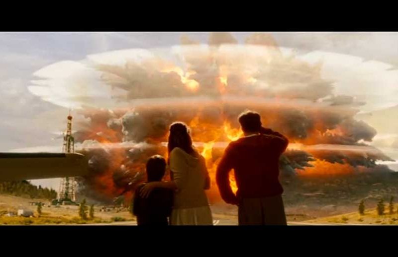 In a frame capture from the disaster movie 2012, visitors watch the Yellowstone caldera explode in a supervolcano eruption that marks the beginning of a planetary series of cataclysmic events. (©2009 Columbia Pictures - click to enlarge)