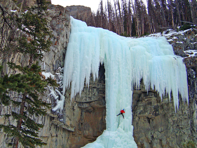 Aaron Mulkey climbs a frozen waterfall called Hells Angel on the Upper South Fork of the Shoshone River, about 45 miles southwest of Cody. (File photo by Joel Anderson - click to enlarge)