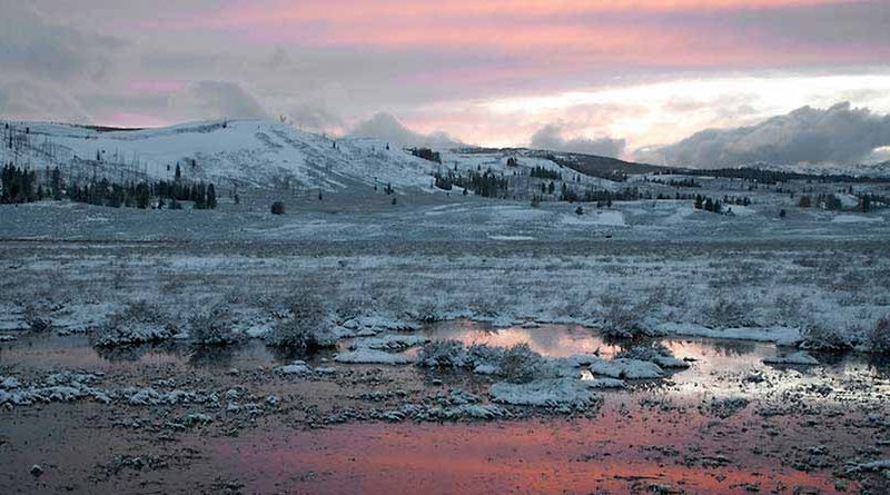 Lucky timing and a little hustle yielded an otherworldly landscape shot at Swan Lake in Yellowstone National Park. (©Meg Sommers - click to enlarge)