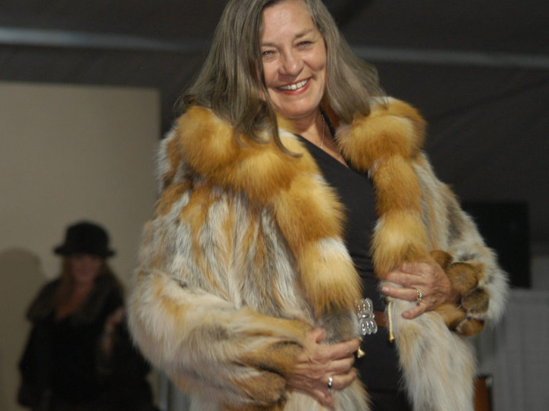 Mayor Nancy Tia Brown models a fur made by Joel Kaye during the Cody High Style Fashion show on Wednesday in Cody, Wyo.