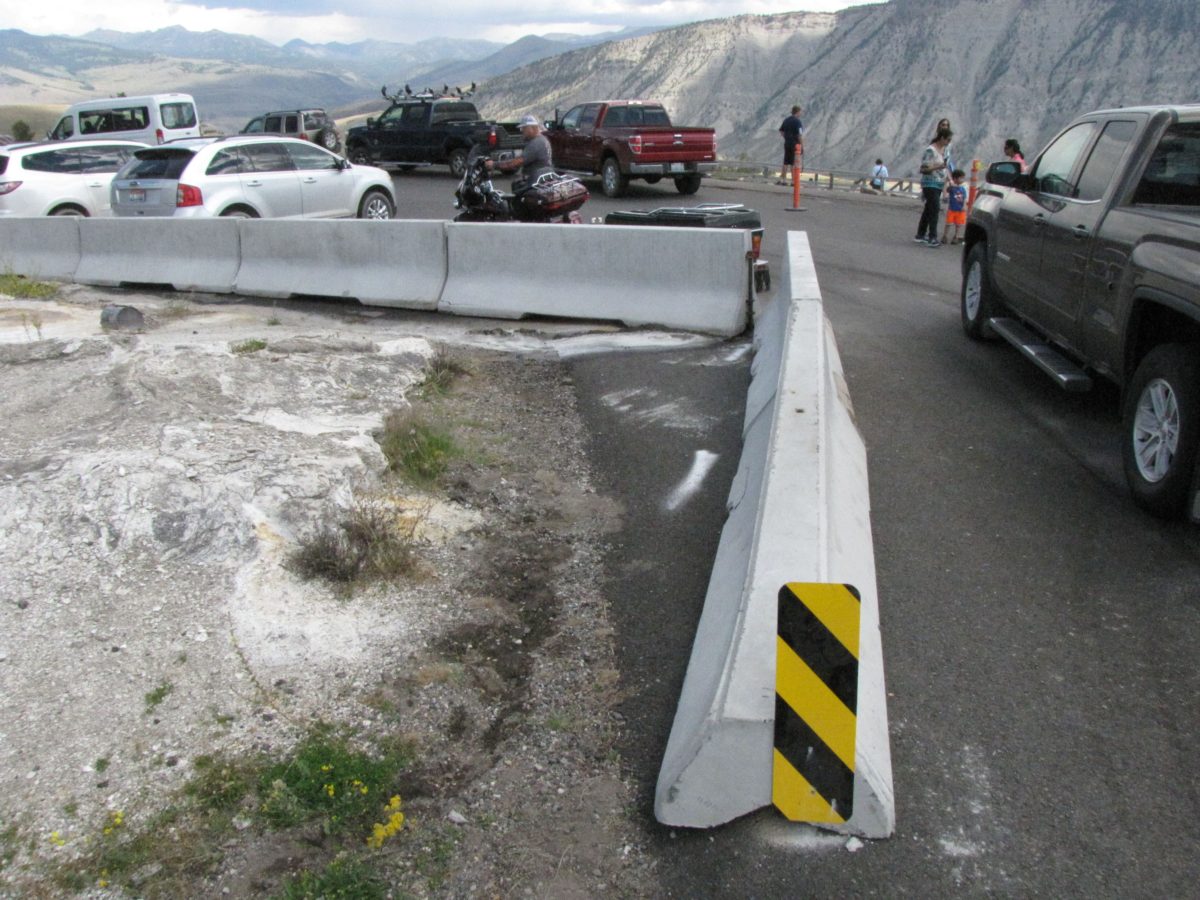 Temporary concrete barriers have been installed around a newly formed thermal feature at the Upper Terrace Drive in Yellowstone National Park.