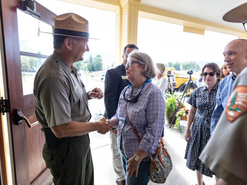 Yellowstone National Park Superintendent Cam Sholly greets visitors during a celebration Aug 30 marking the reopening of the Mammoth Hot Springs Hotel folowing a $30-million renovation. (NPS photo/Jacob W. Frank)